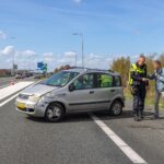 Auto over de kop op A32 Heerenveen